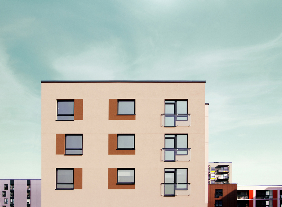 Pink building facade with square windows