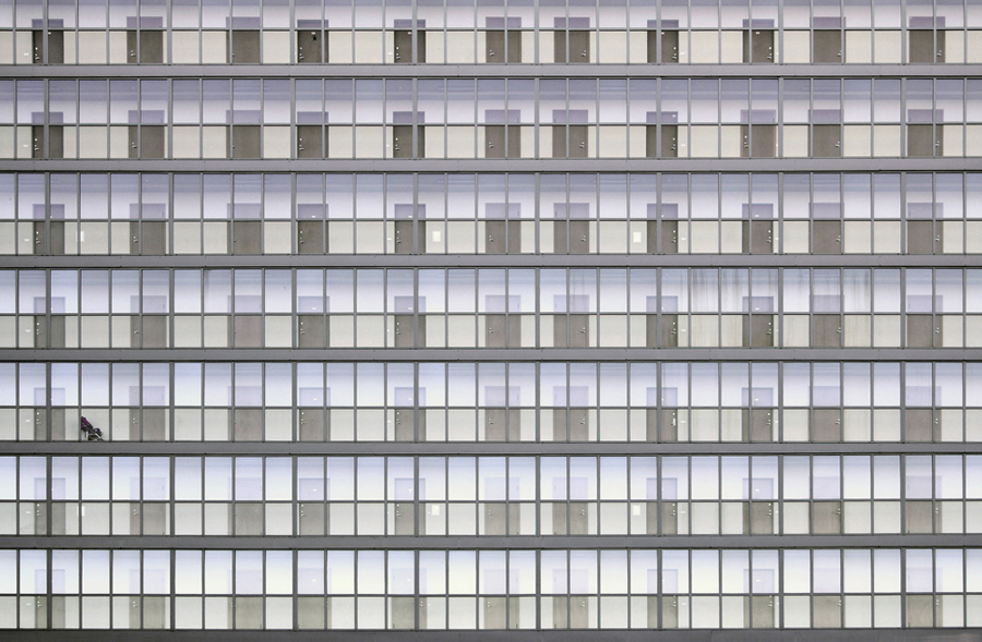 Regular grid of windows across a facade