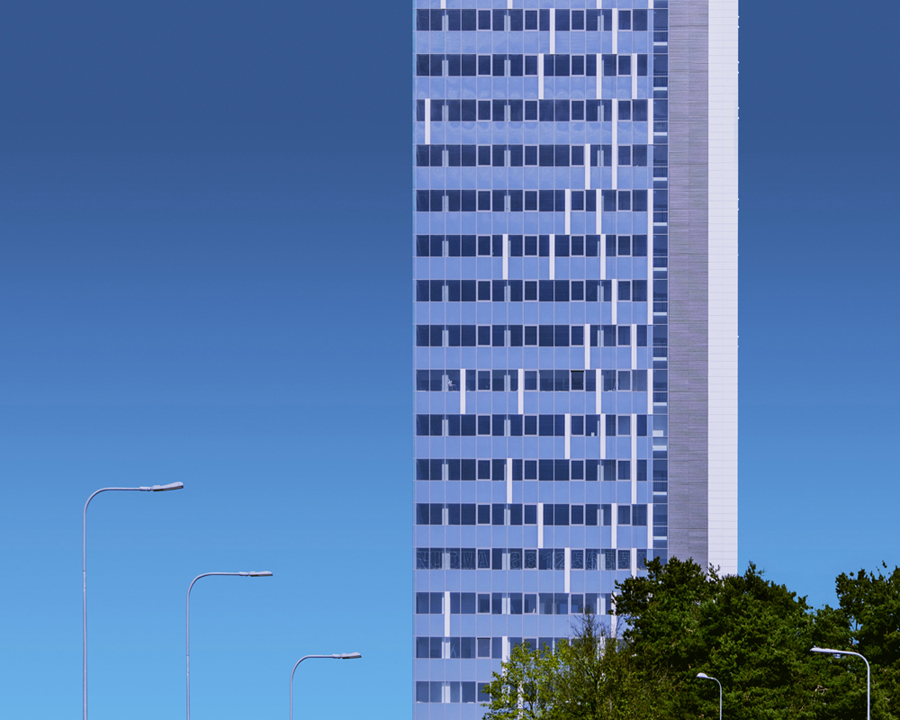 High-rise tower against a blue sky