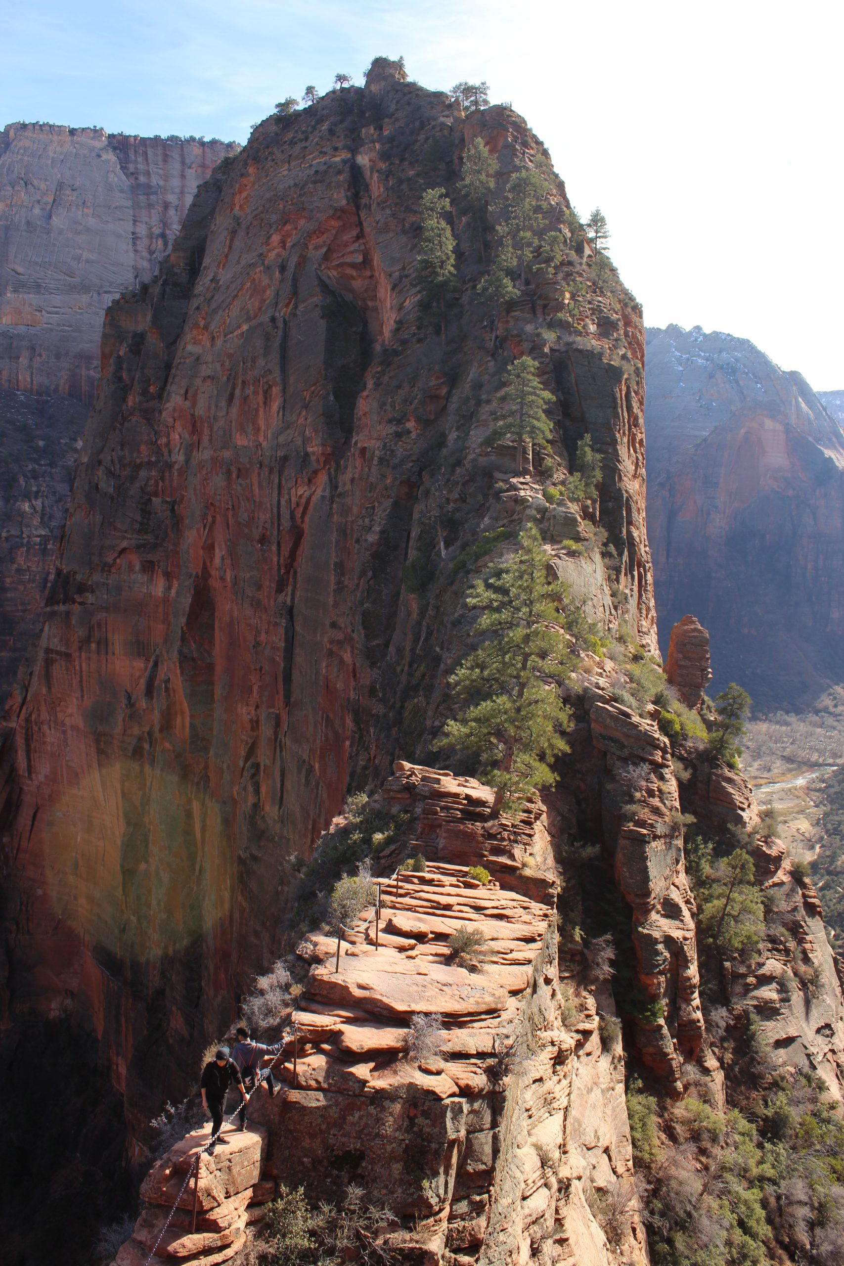 A hiker on the chained ridge of Angels Landing above Zion Canyon, NPS photo by Brian Whitehead