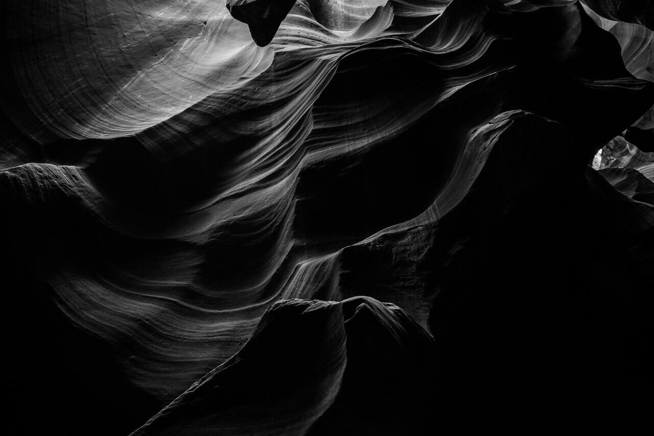 Black-and-white sandstone waves inside Antelope Canyon, Arizona, photographed by Edin Chavez
