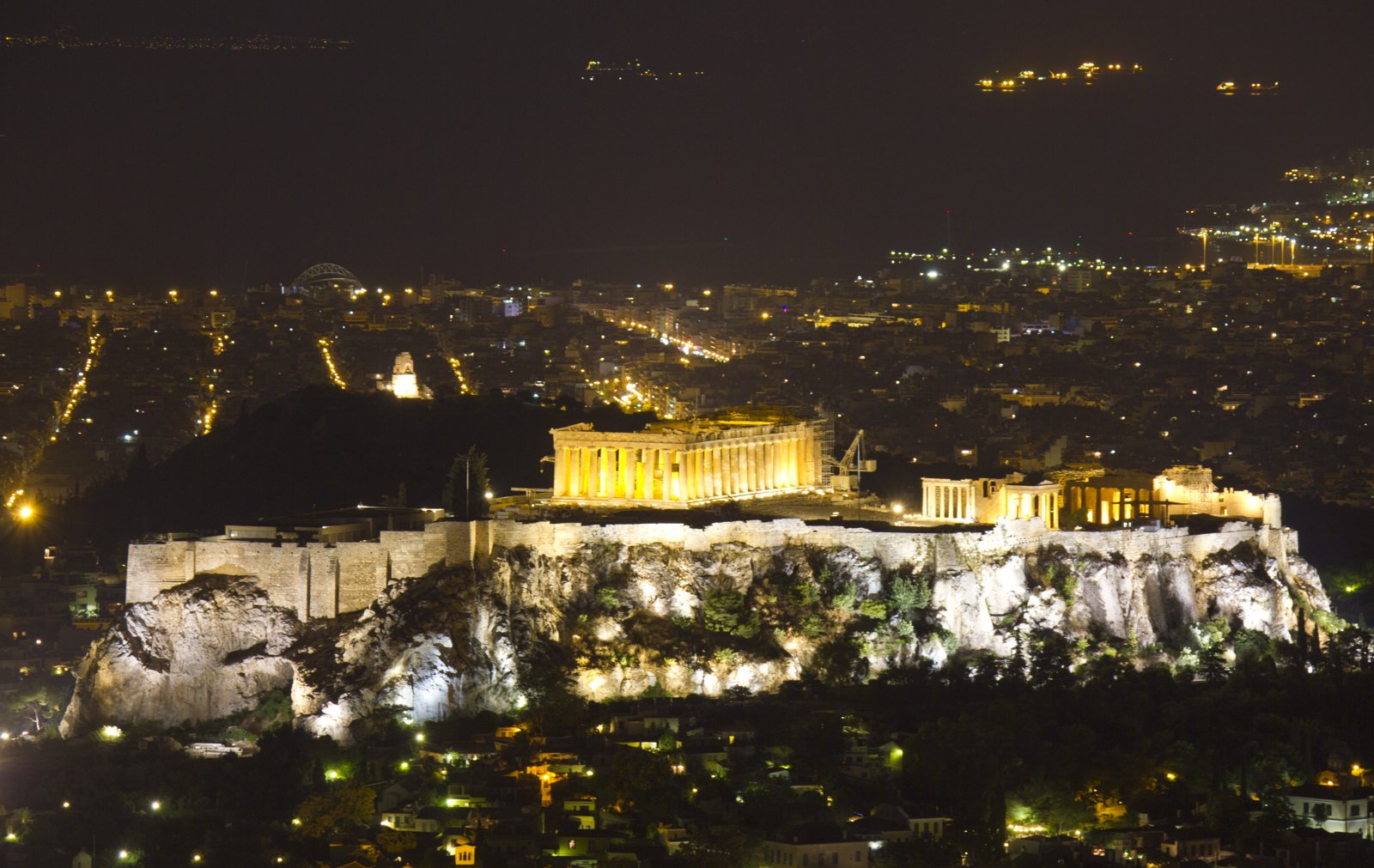 The floodlit Parthenon and Acropolis rock seen from Mount Lycabettus at night
