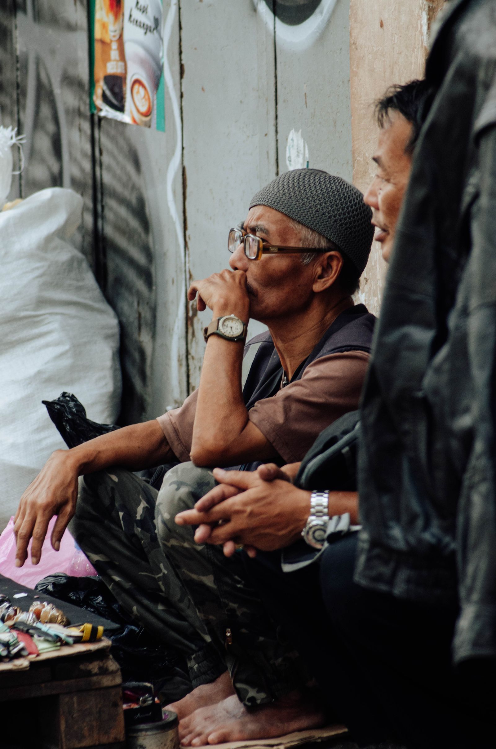 Street vendors in a candid market scene