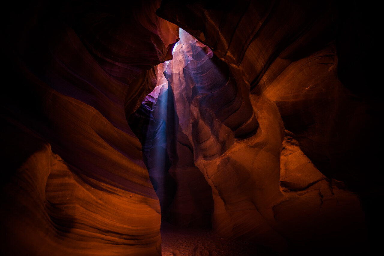 Warm glowing sandstone walls inside Antelope Canyon, Arizona, photographed by Edin Chavez