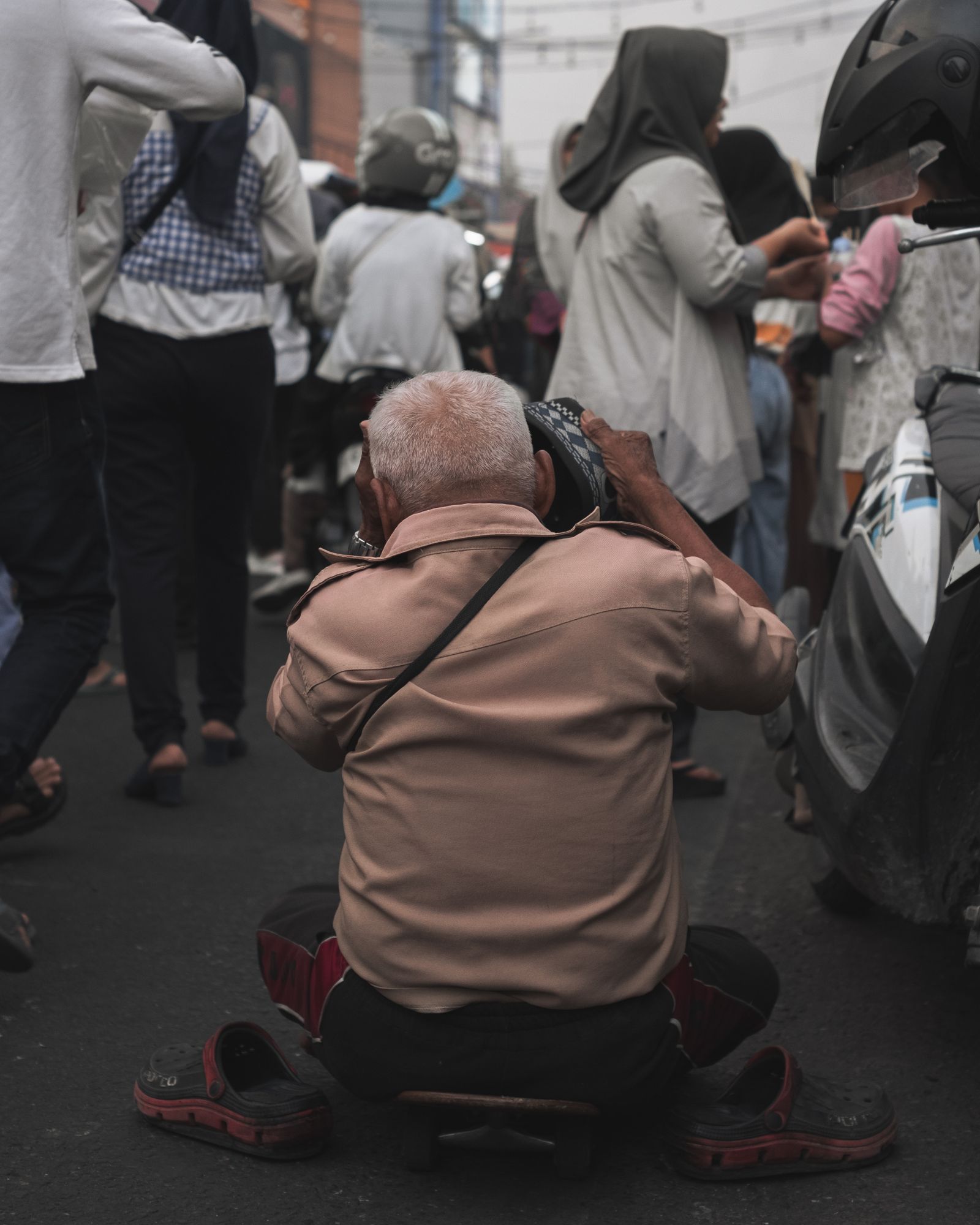 Photographer capturing an urban street scene