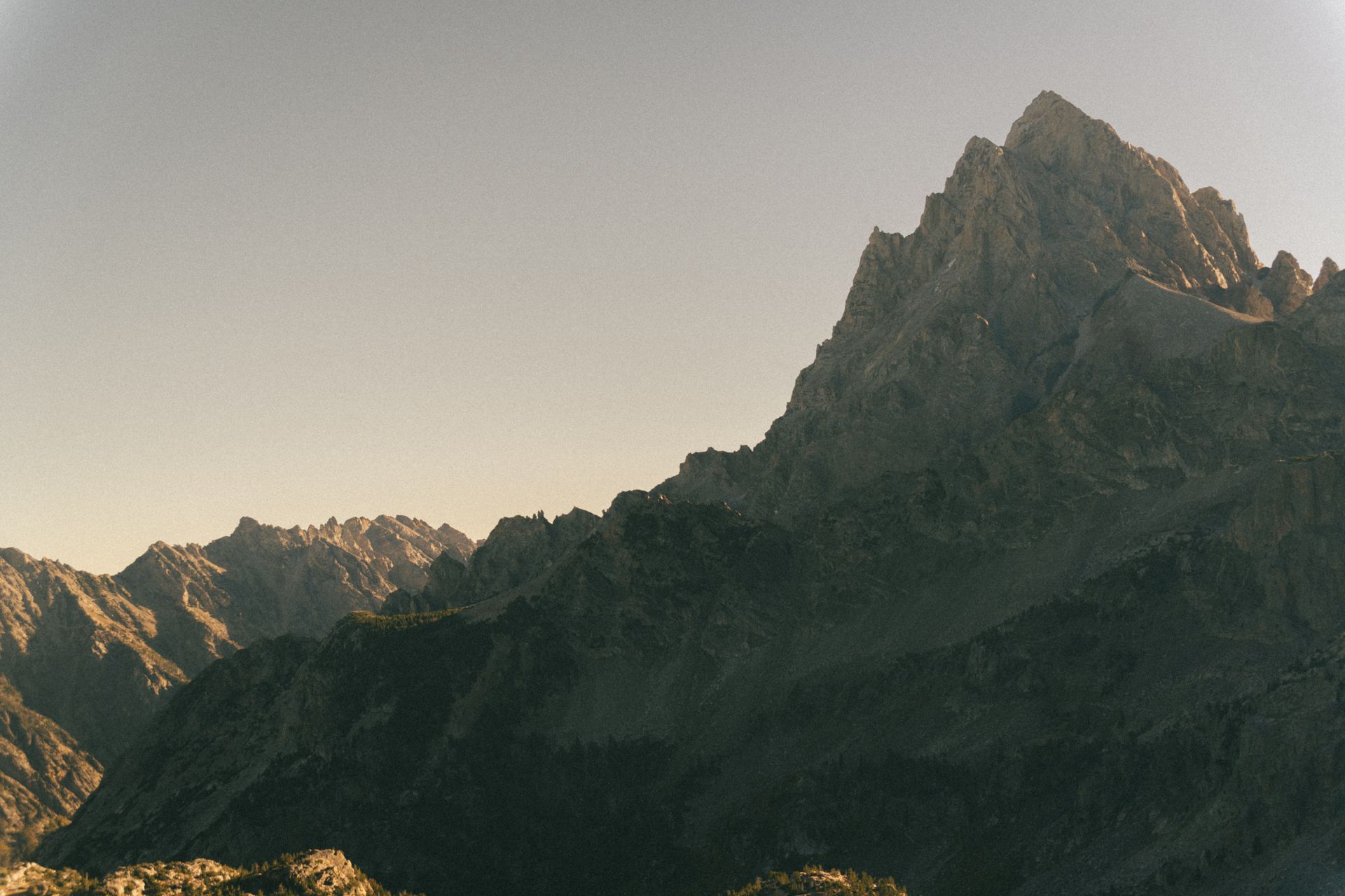 The Grand Teton peak catching first light at dawn
