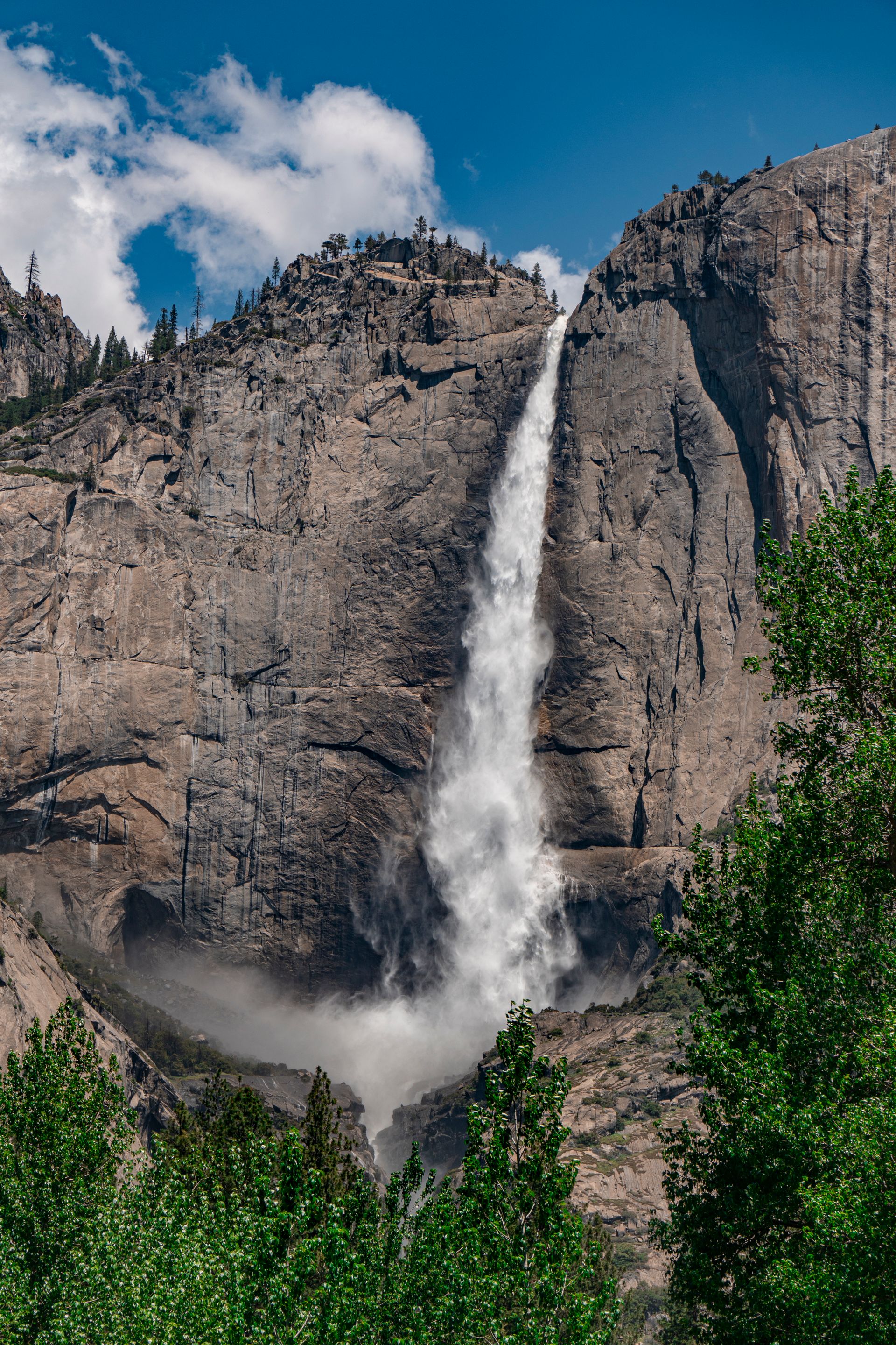 Upper Yosemite Falls at full spring flow against a granite wall