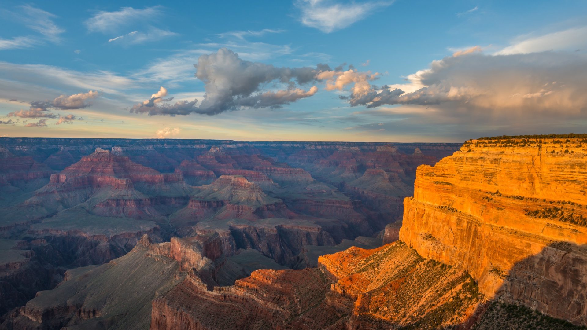 Edin Chavez Grand Canyon photograph with warm directional light on the right cliff and cooler distant layers