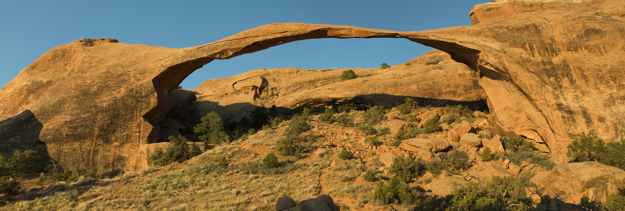 Landscape Arch thin sandstone span in morning light at Arches National Park