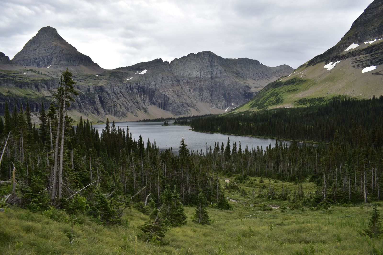 An alpine lake in a glacial valley in the Many Glacier country