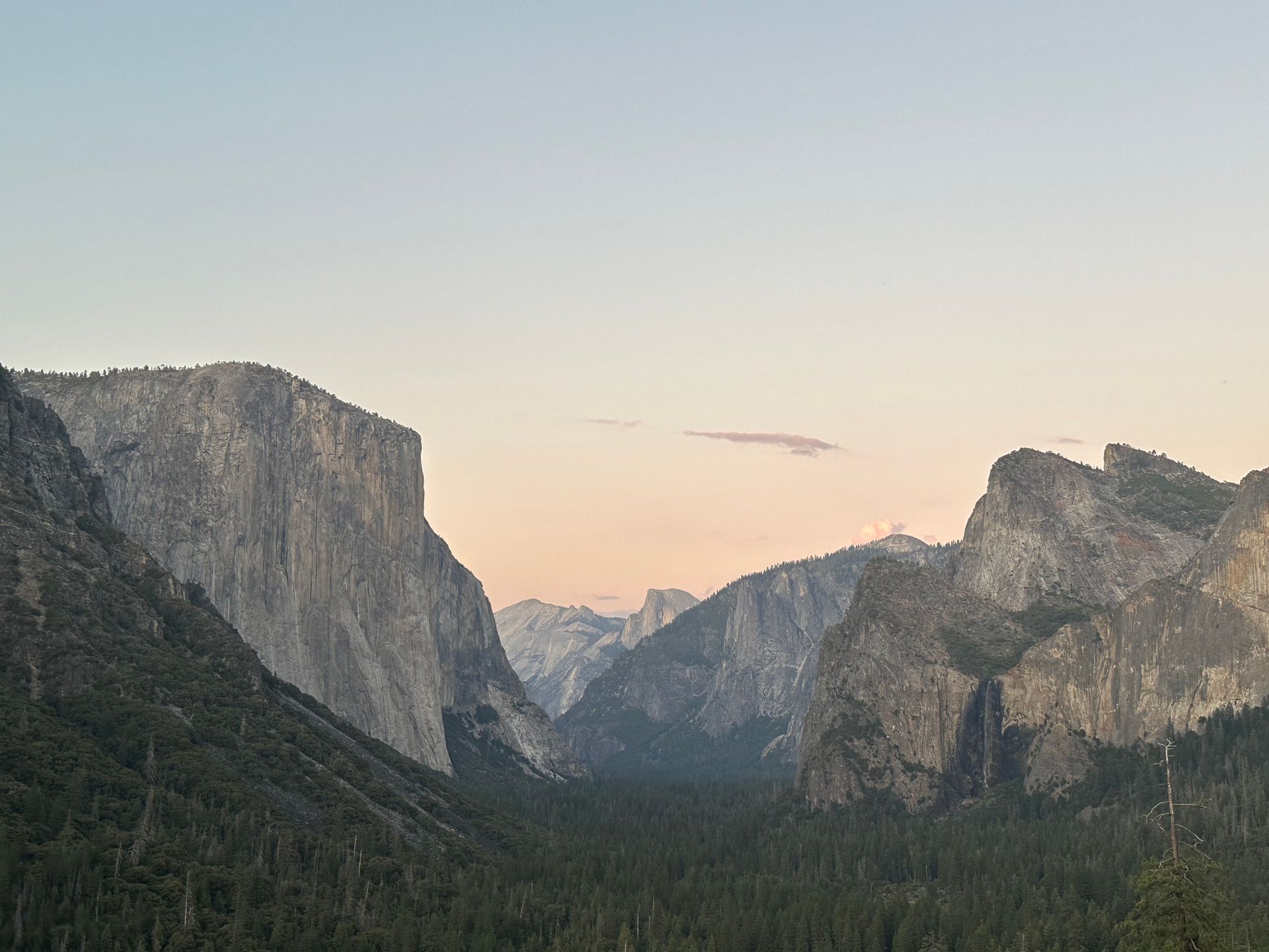 El Capitan and the Yosemite Valley walls in pastel dusk light