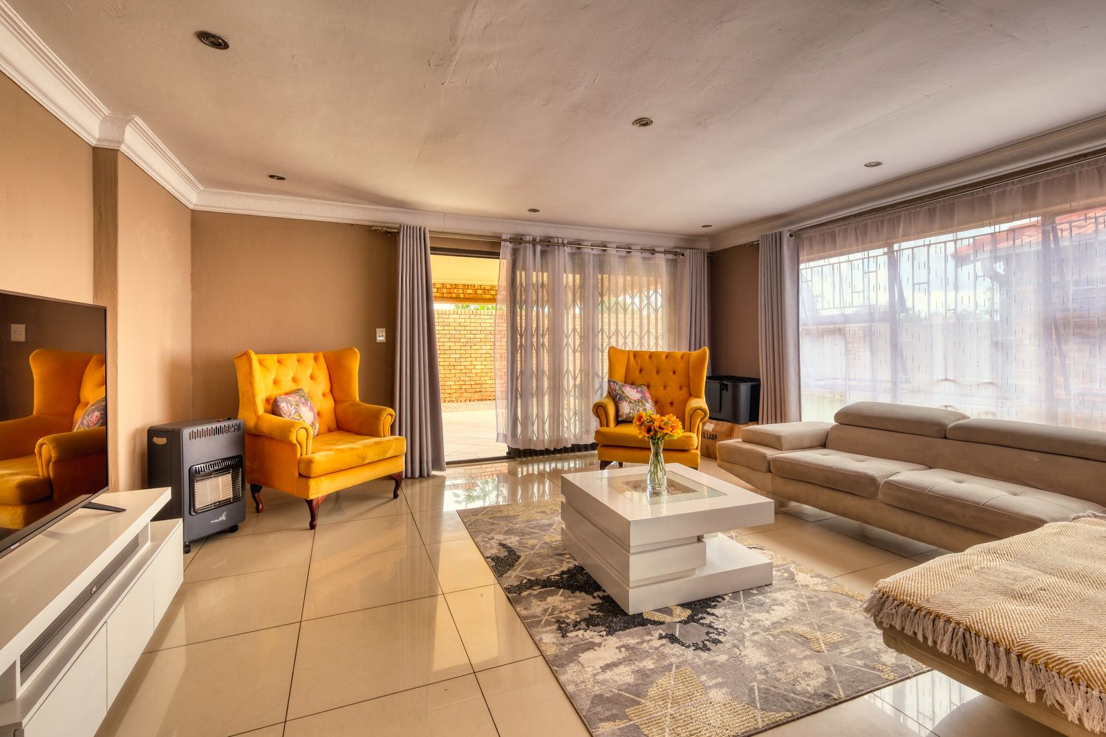 Living room with bright windows and balanced interior exposure