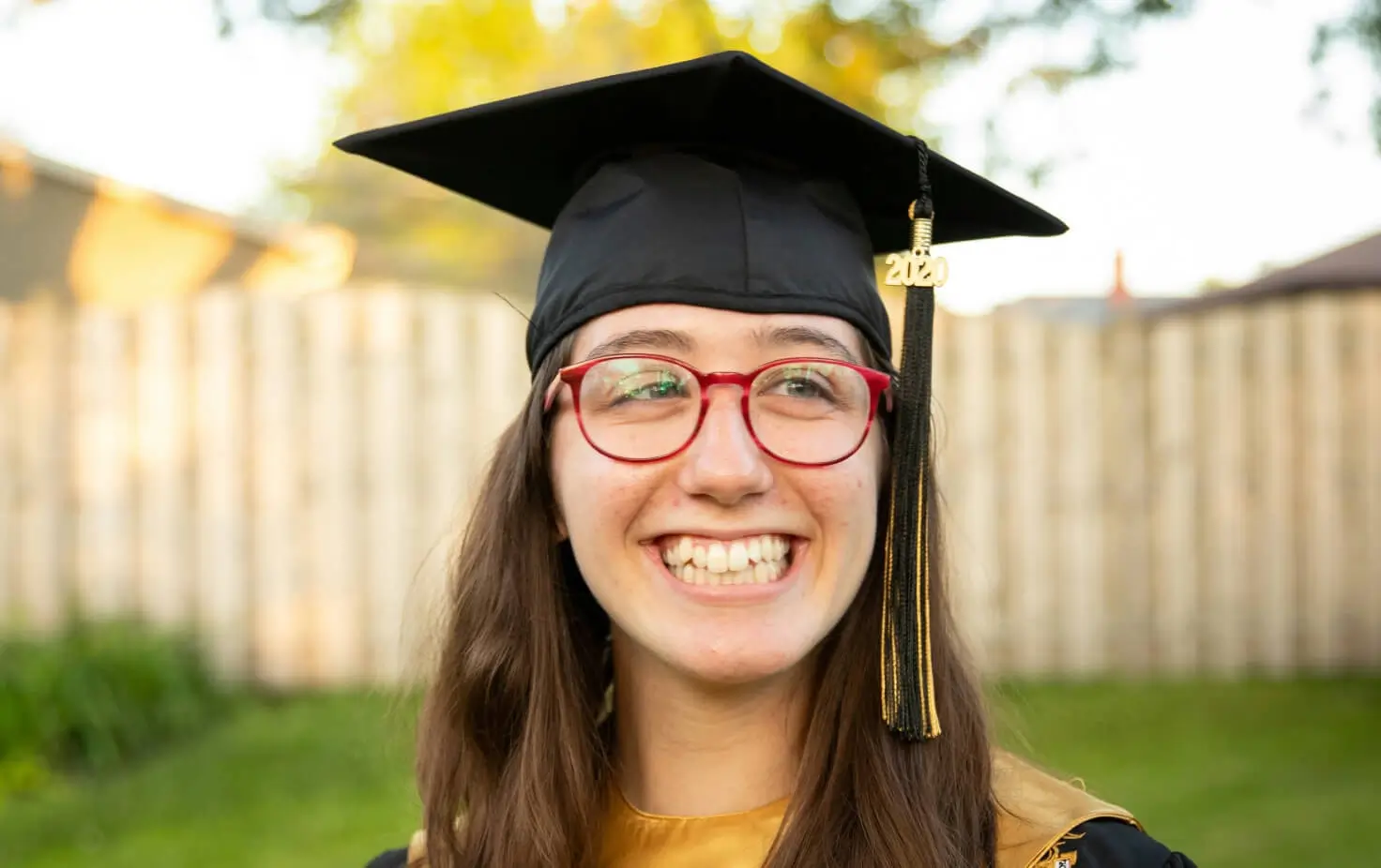 Graduate portrait before retouching in Aftershoot
