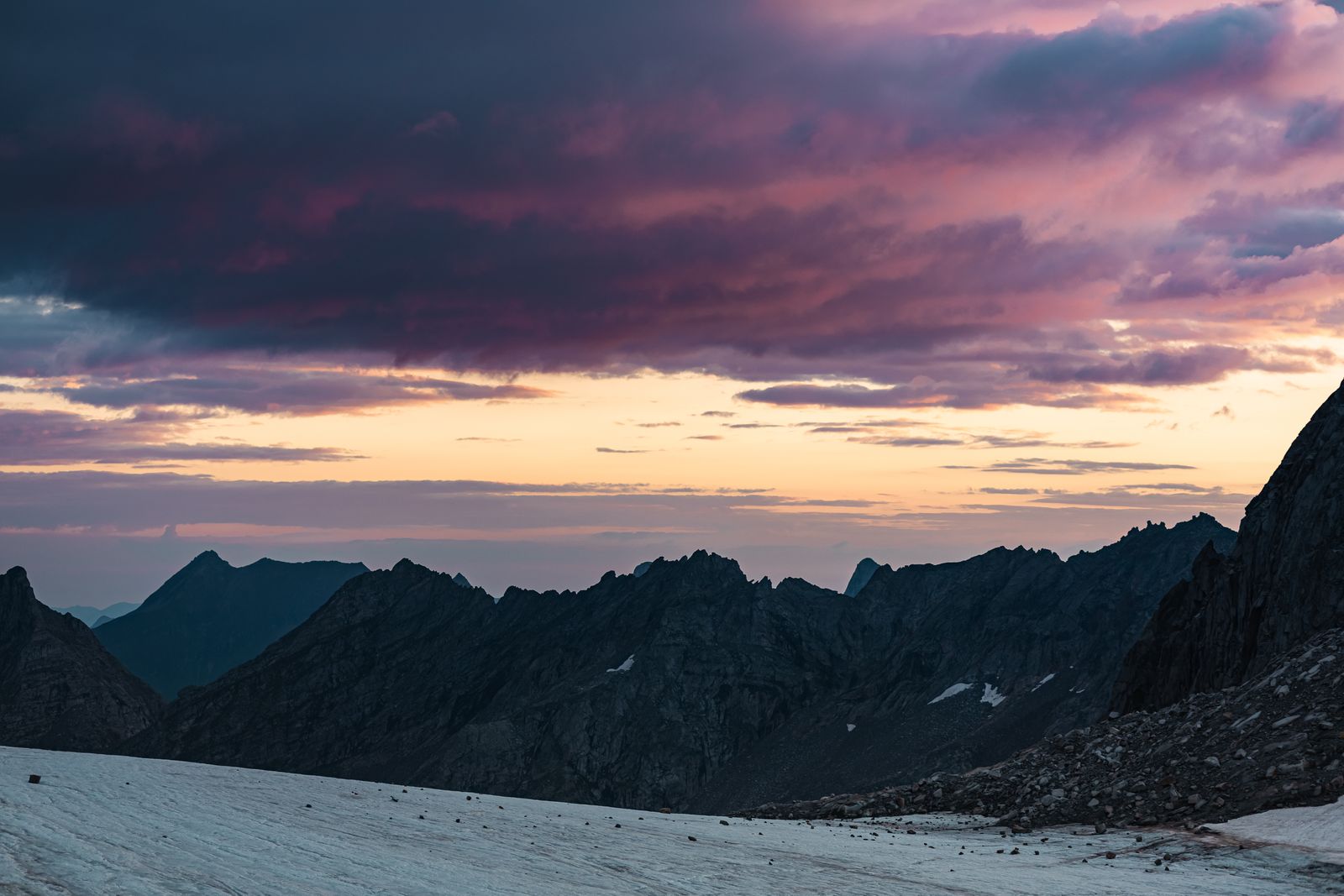 Mountain sunset with vibrant clouds