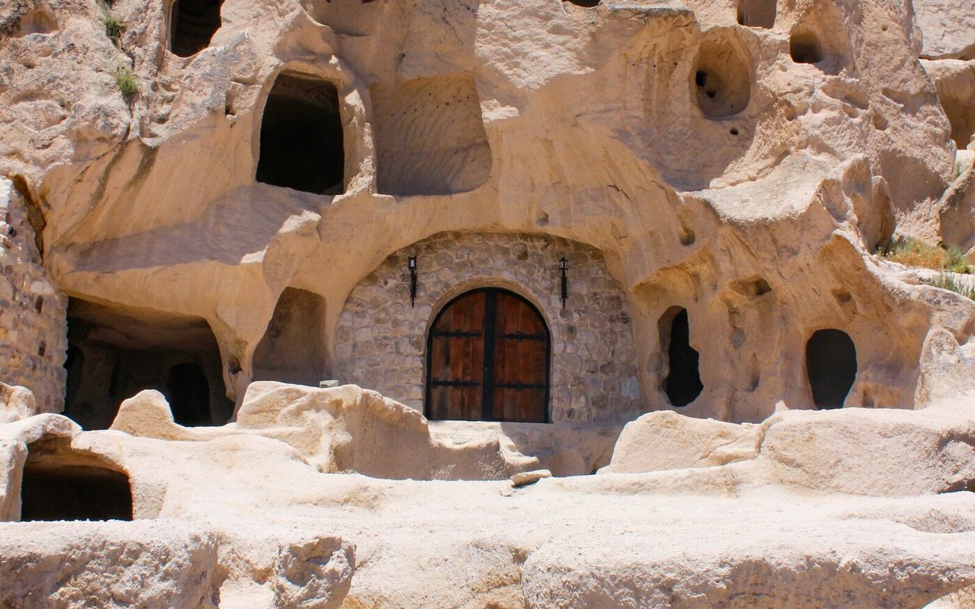 Cave dwellings carved into volcanic rock at Bandelier National Monument, New Mexico