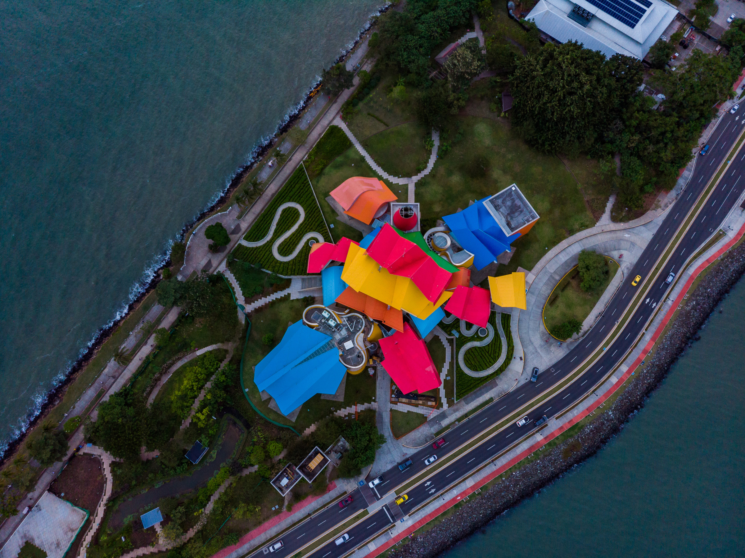 Biomuseo colorful roof planes on Amador Causeway, historic aerial photograph by Edin Chavez