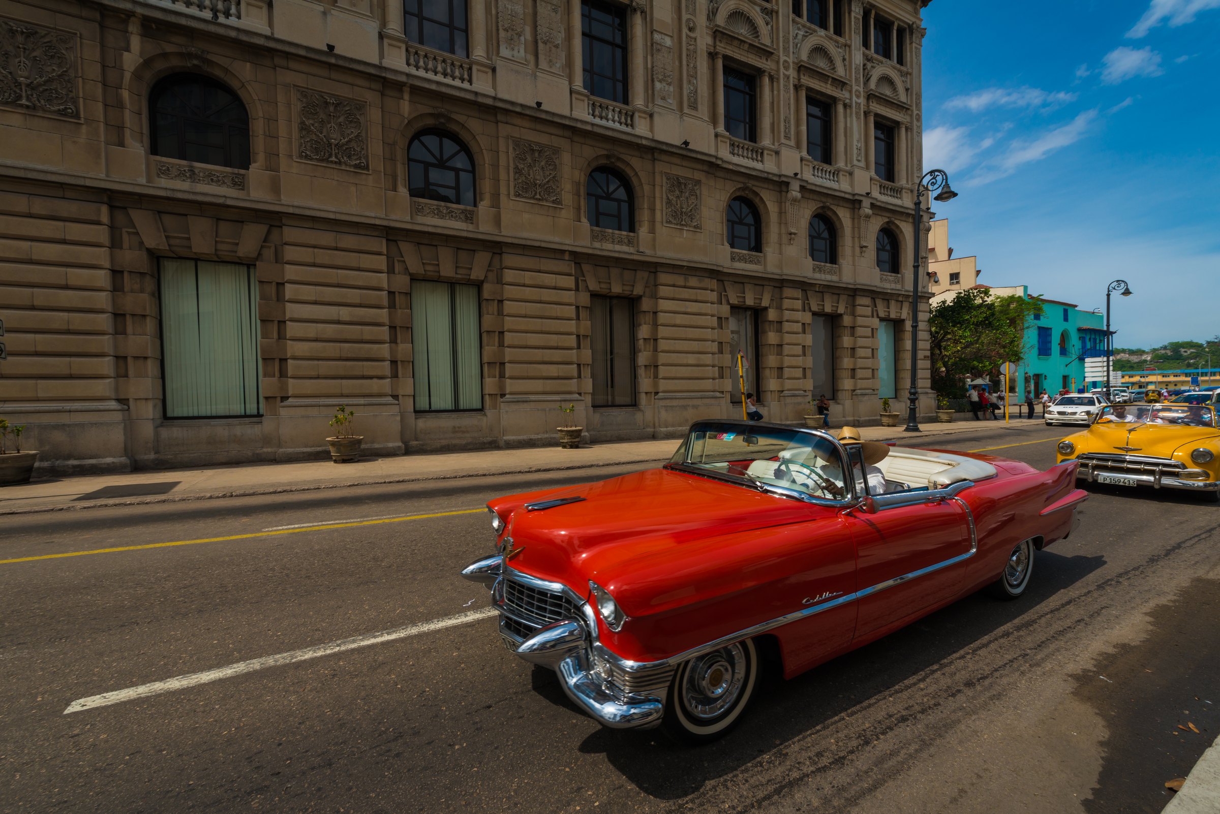 Red vintage Cadillac convertible on a Havana street, Cuba