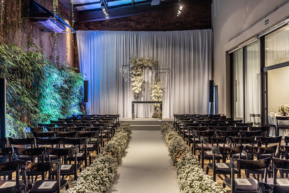 A beautiful wedding venue decorated with flowers, showing elegance and romance.